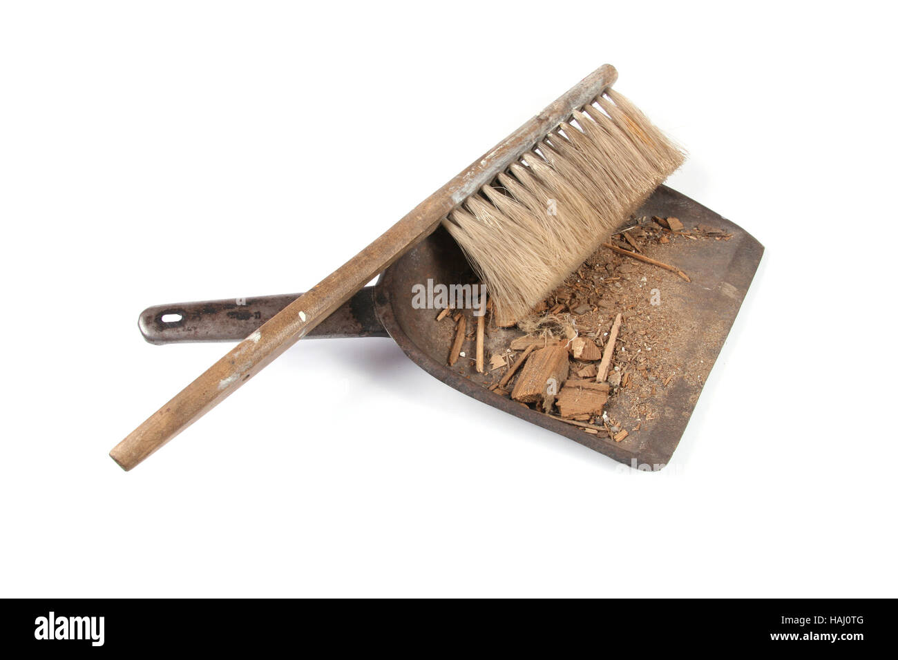 Brush and shovel with dust Stock Photo