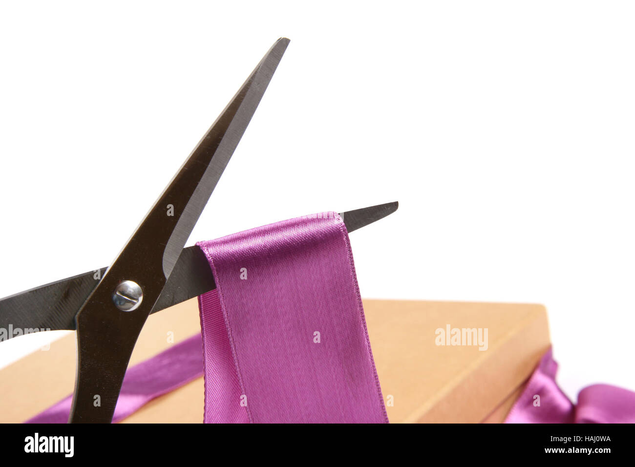 Gift wrapping scissors cutting ribbon Stock Photo Alamy