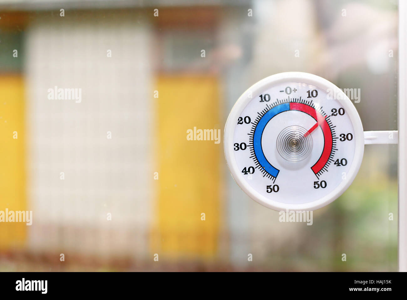 outdoor thermometer behind the window Stock Photo - Alamy