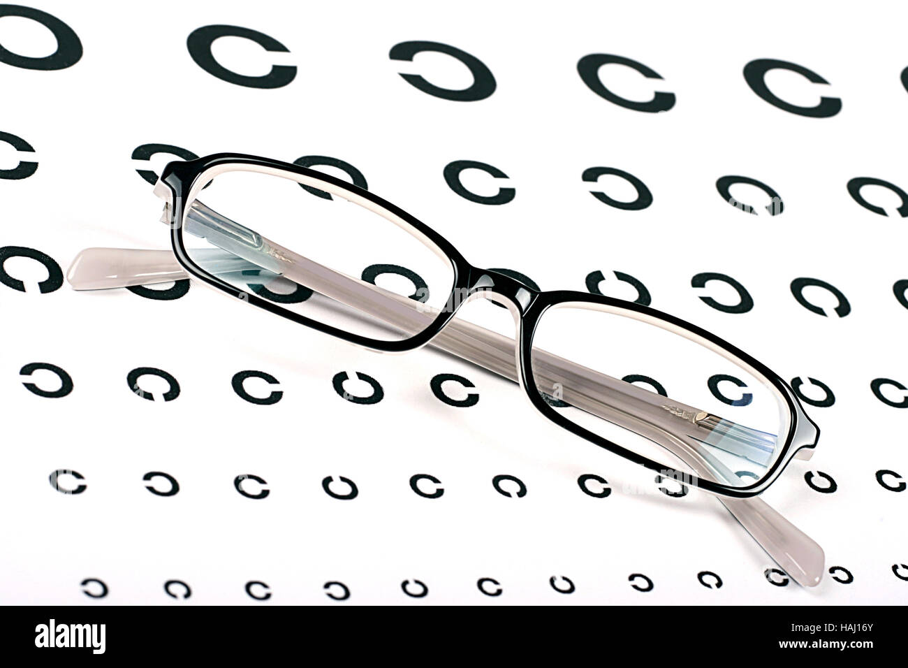 black glasses on a eye sight test chart Stock Photo