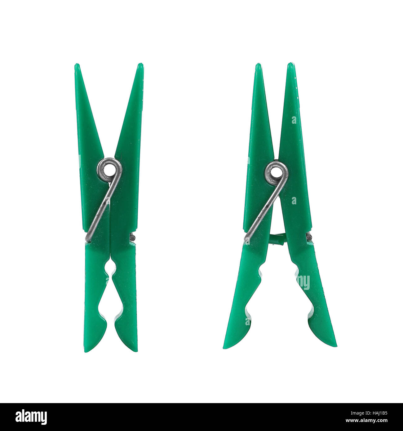 two green clothes peg Stock Photo