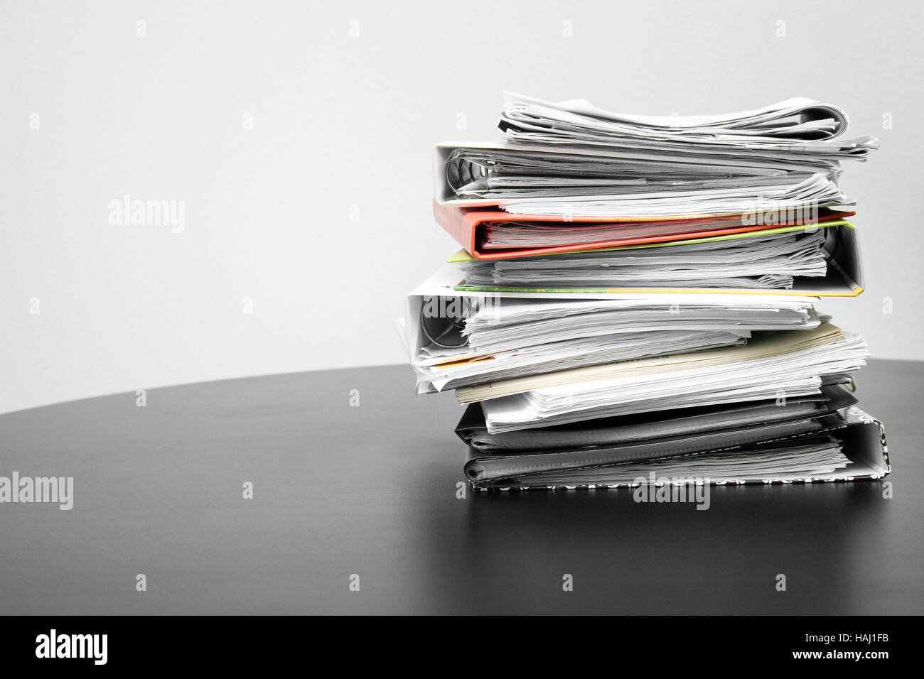 stack of folders and documents on office table Stock Photo