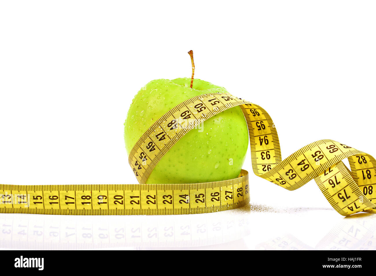 diet concept. apple with measuring tape Stock Photo