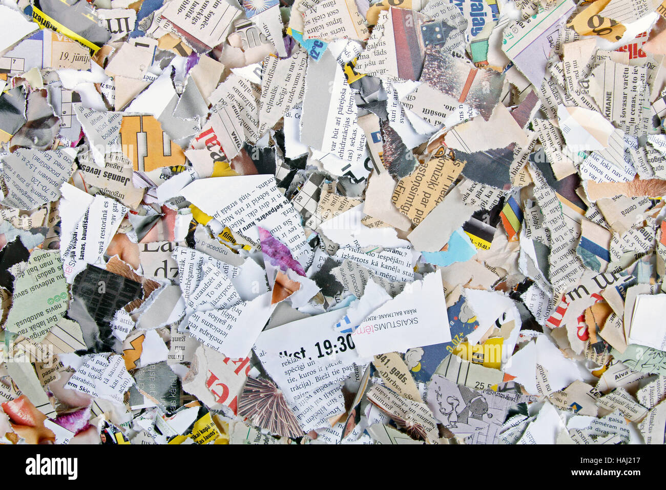 background with different torn newspapers and magazines Stock Photo