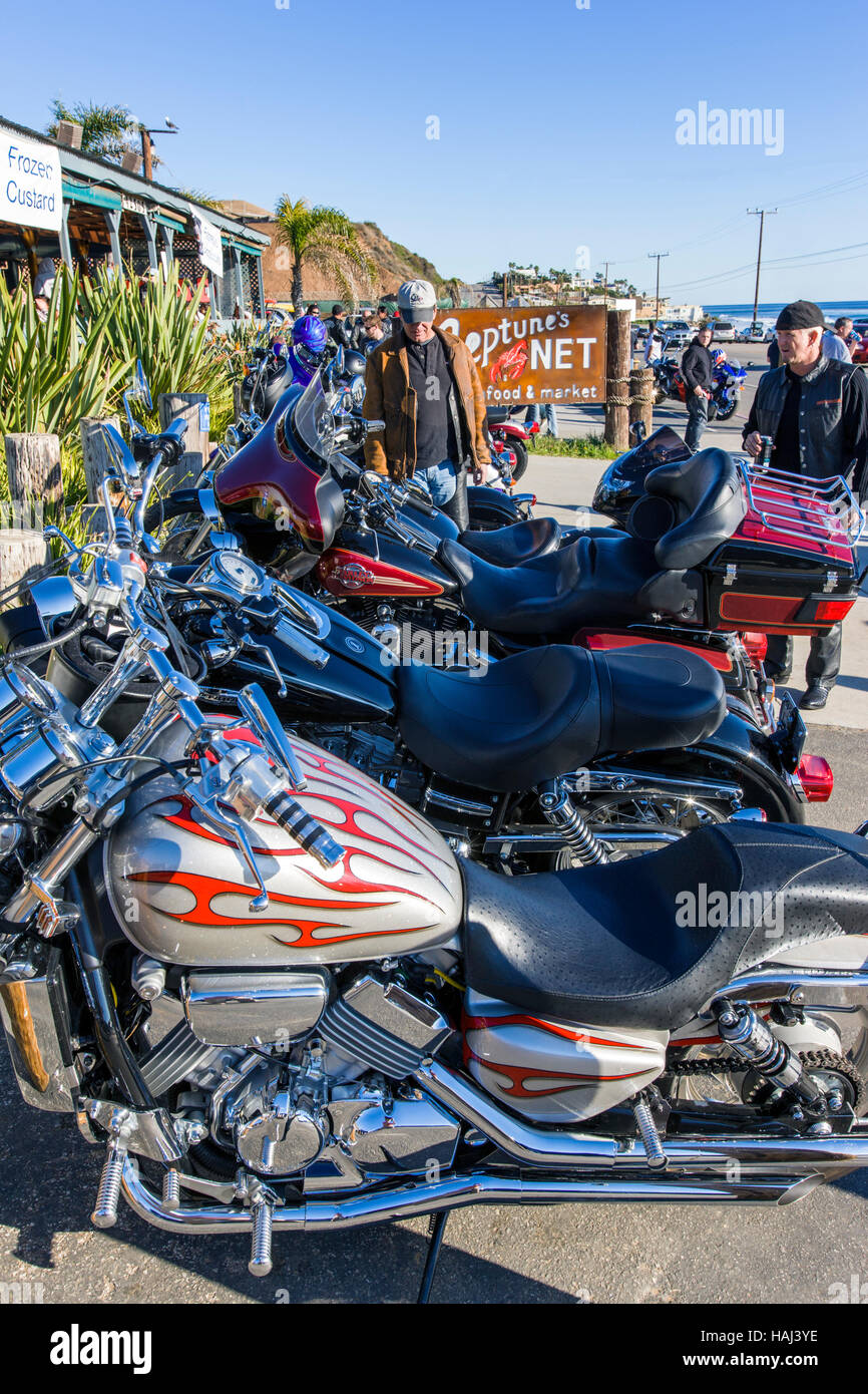 Harley Davidson motorcycles parked in front of the Neptune's Net Seafood Restaurant on Rt. 1 in Malibu, California, USA Stock Photo