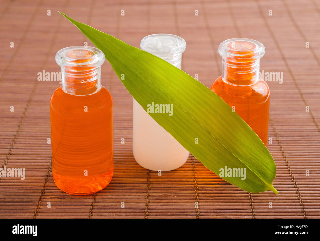 wellness products bottles with bamboo leaf Stock Photo Alamy