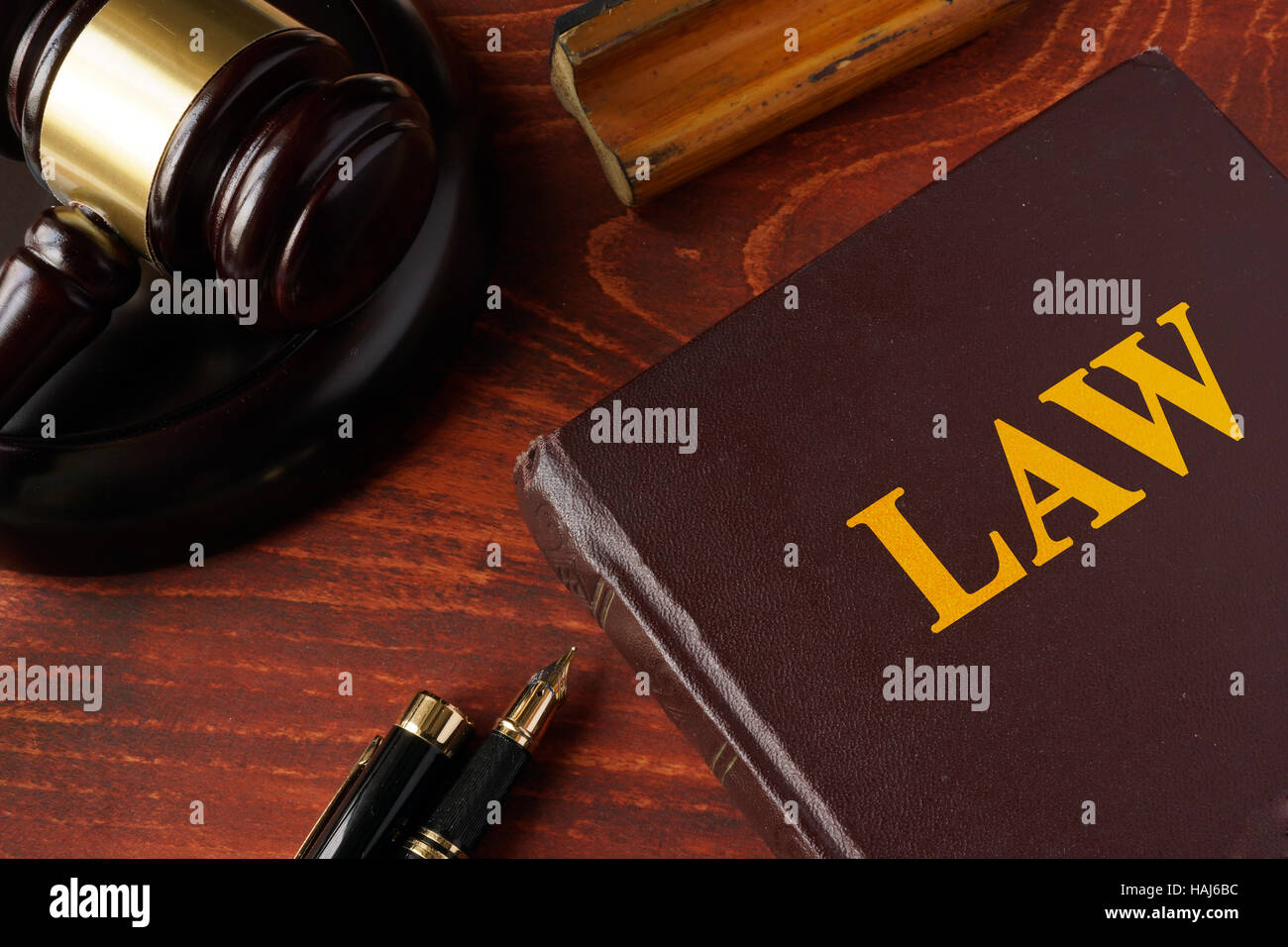 Law concept.  A gavel and legal book. Stock Photo