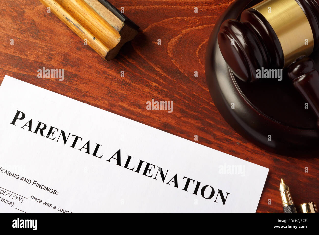Parental alienation form and gavel on a table. Stock Photo
