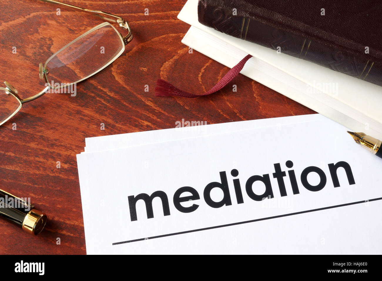 Papers with title mediation on a table. Stock Photo