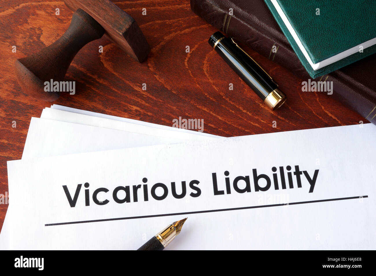 Papers with title Vicarious Liability on a table. Stock Photo
