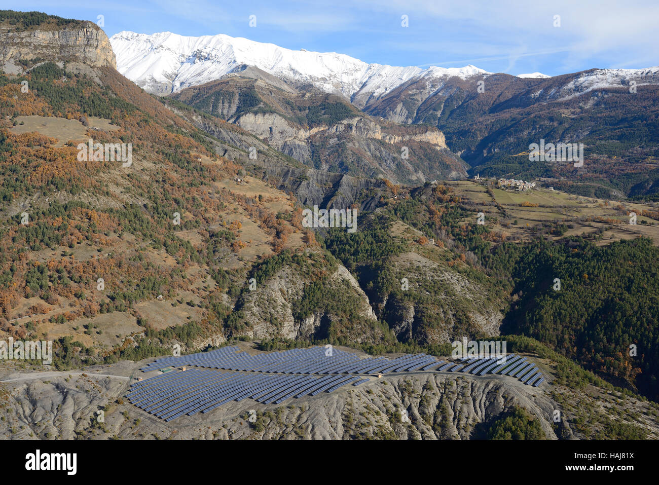 AERIAL VIEW. Solar power plant near the environmentally sensitive Mercantour National Park. Villeneuve d'Entraunes, Alpes-Maritimes, France. Stock Photo