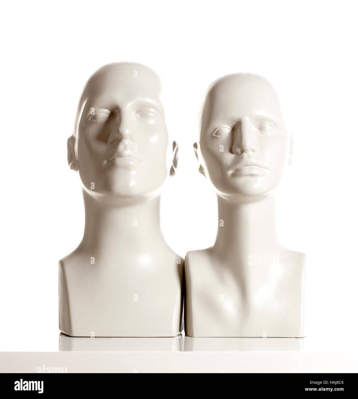Male and Female Mannequin Heads on White Stock Photo