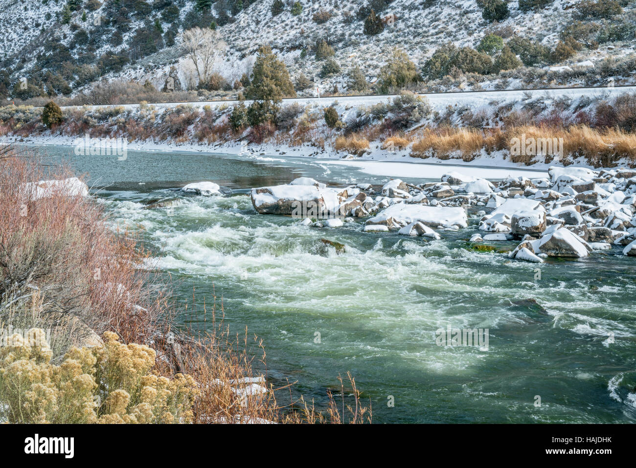 Rodeo Rapid on the upper Colorado River at Burns, Colorado, USA, looking upstream, winter scenery Stock Photo