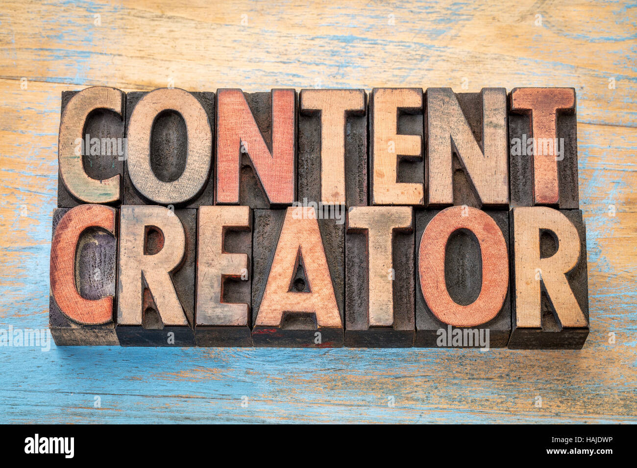 content creator - word abstract in vintage letterpress wood type printing blocks Stock Photo