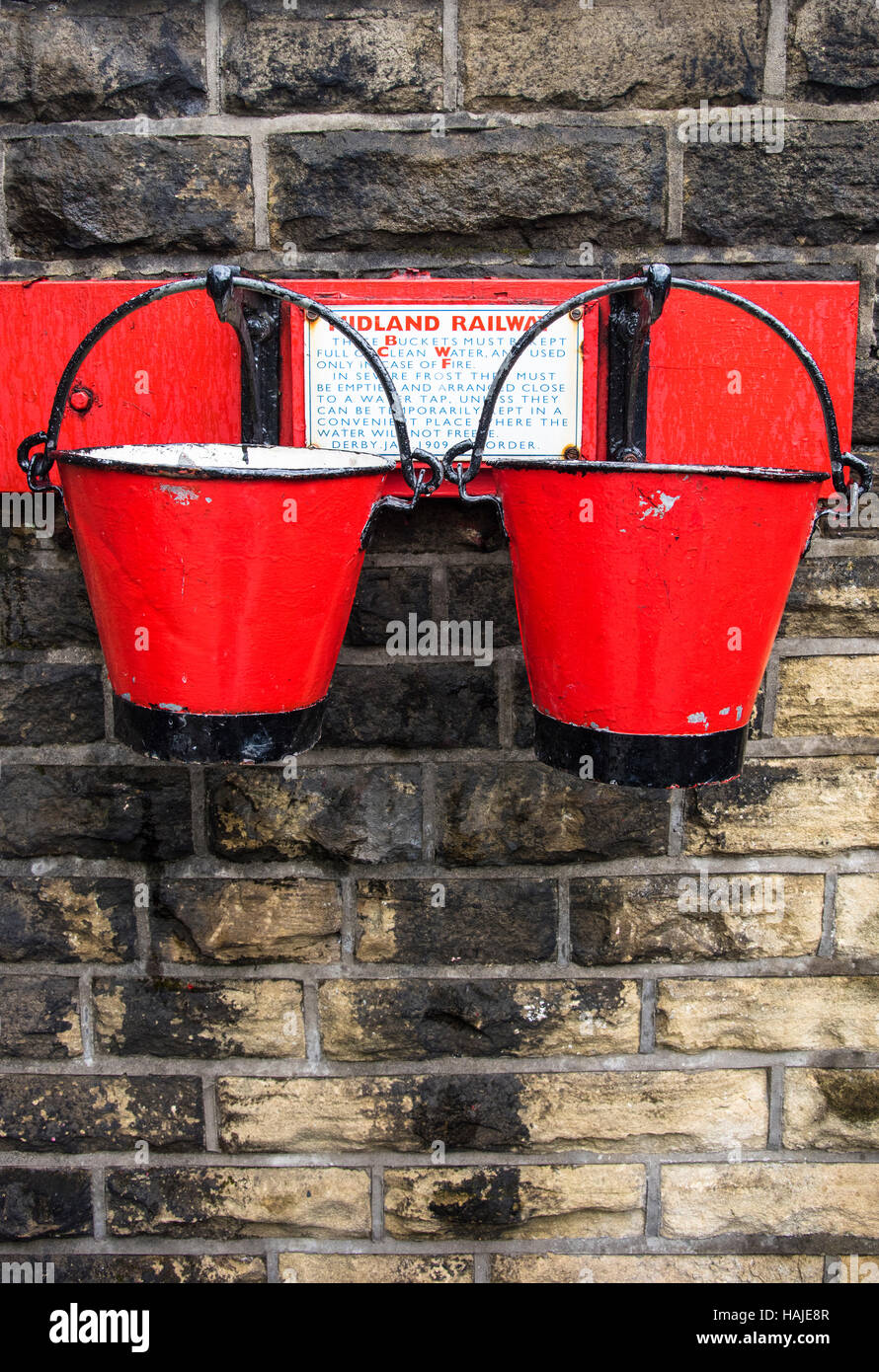 Old fire baskets at the Oakworth railway station, part of the Keighley and Worth Valley Railway, Oakworth, Yorkshire, UK Stock Photo