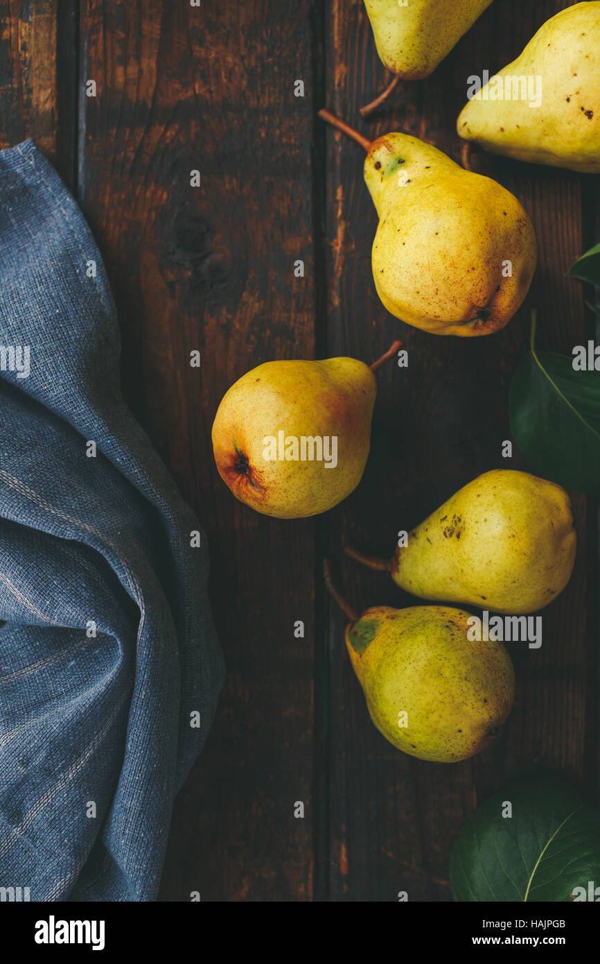 Fresh pears on a wooden surface Stock Photo