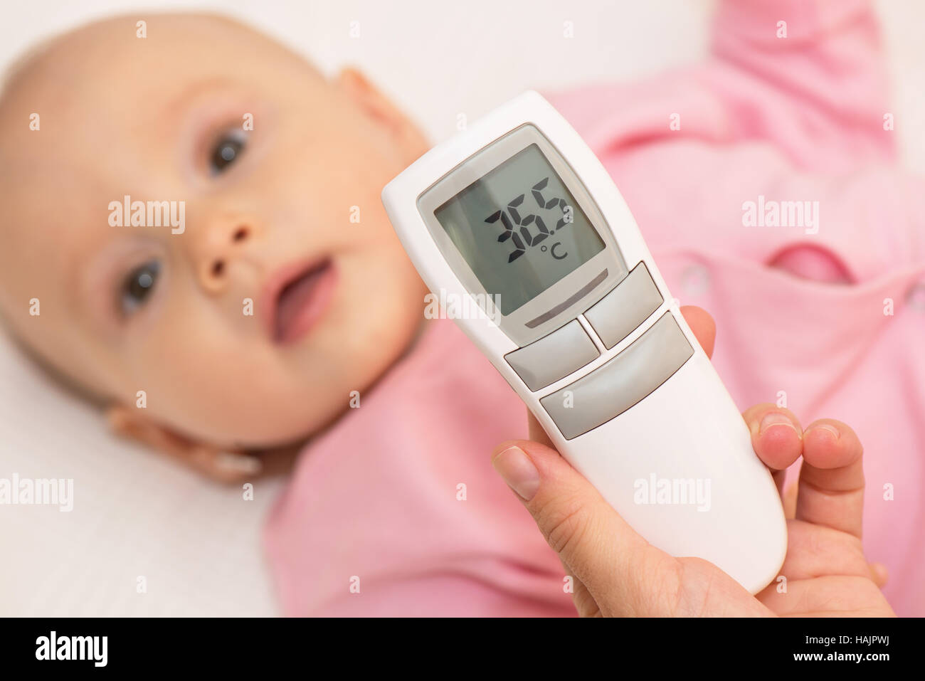 Ear thermometer hi-res stock photography and images - Page 2 - Alamy
