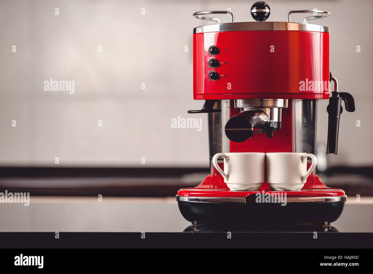 An espresso machine and two cups Stock Photo