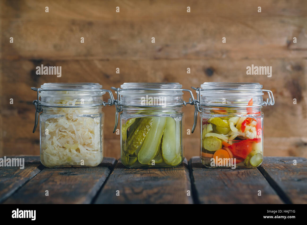 Pickled vegetables in glass jars Stock Photo
