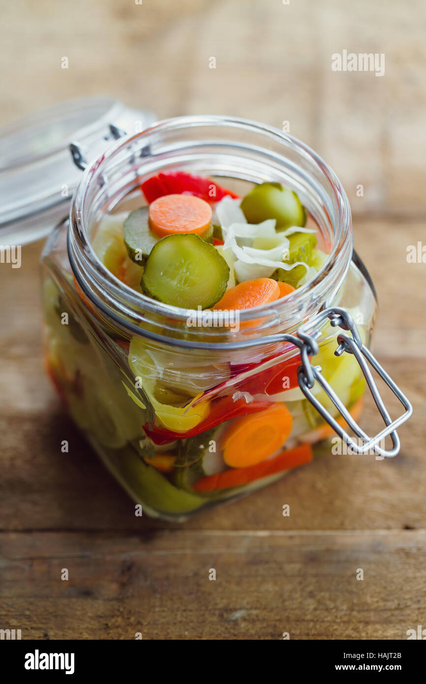 Pickled vegetables in glass jar Stock Photo