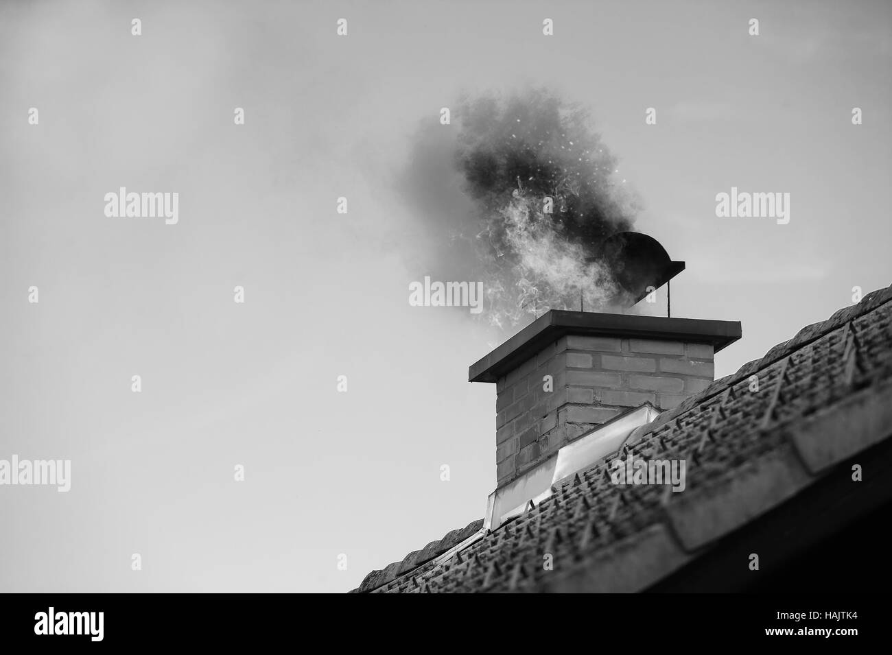 Smoke coming out of a chimney Black and White Stock Photos & Images Alamy
