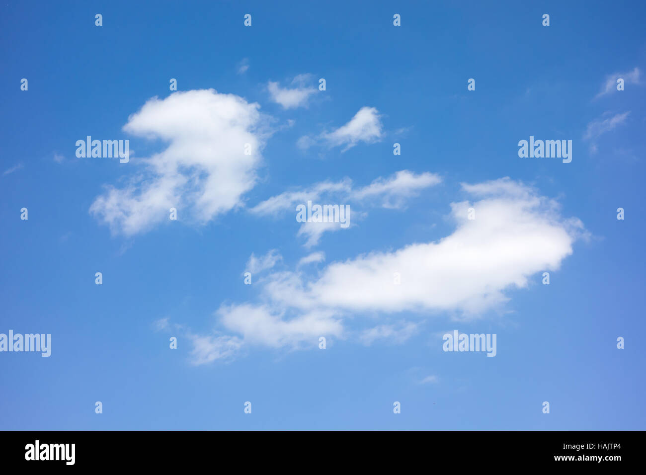 white clouds moving in blue sky summer day Stock Photo