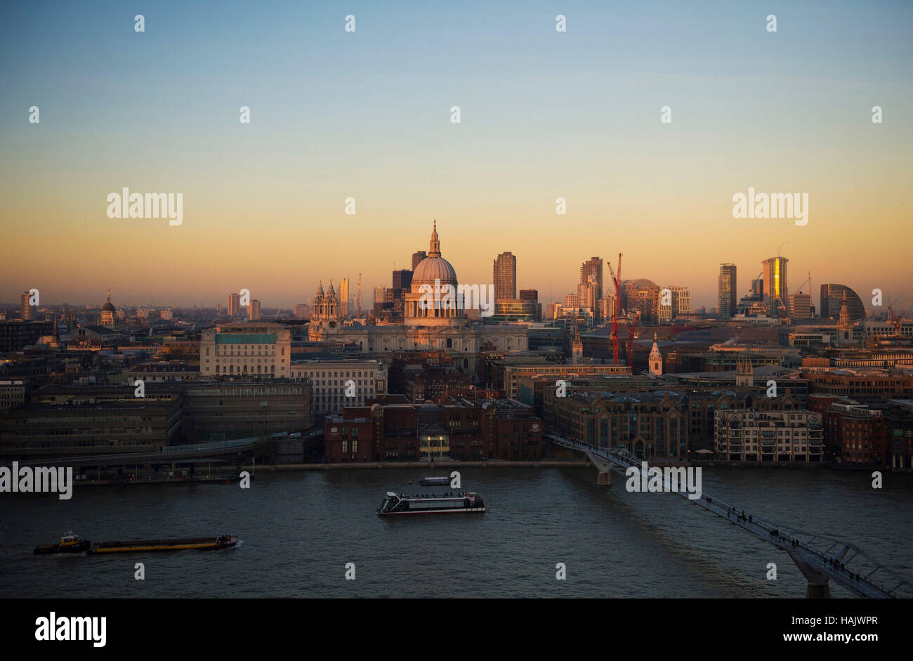 The sun sets over St Paul's Cathedral in London, as today marks the start of the meteorological winter. Stock Photo