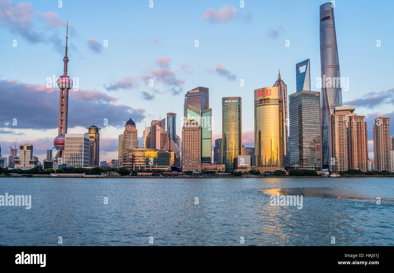 Sunset Pudong - A sunset view of Shanghai skyline of Lujiazui Pudong New Area at east bank of Huangpu River in central Shanghai. Stock Photo
