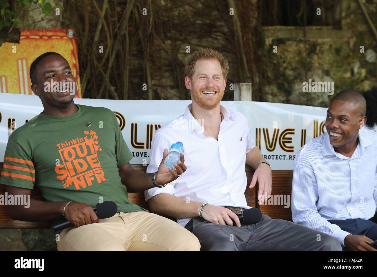Prince Harry on stage during a visit to 'Nature Fun Ranch', which allows young people to speak freely with one another about important topics, including HIV/AIDS, providing them with a positive focus to guide their lives in the right direction, during his tour of the Caribbean. Stock Photo