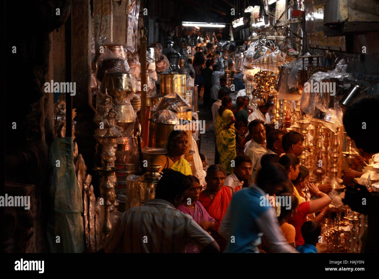 A busy Indian street market selling utensils, mostly used for Hindu worship Stock Photo