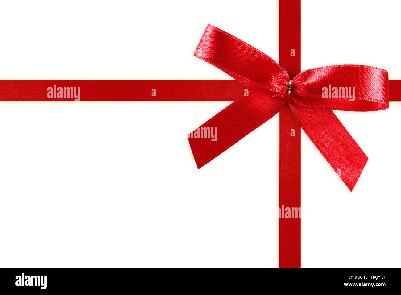 shiny red satin ribbon with bow on white background Stock Photo