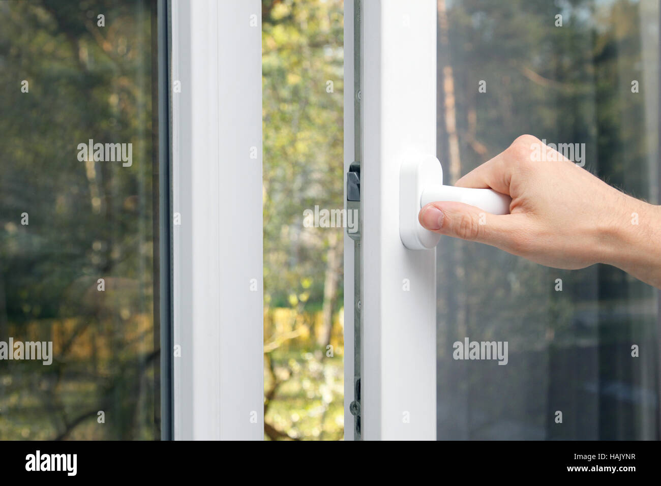 hand open plastic window Stock Photo