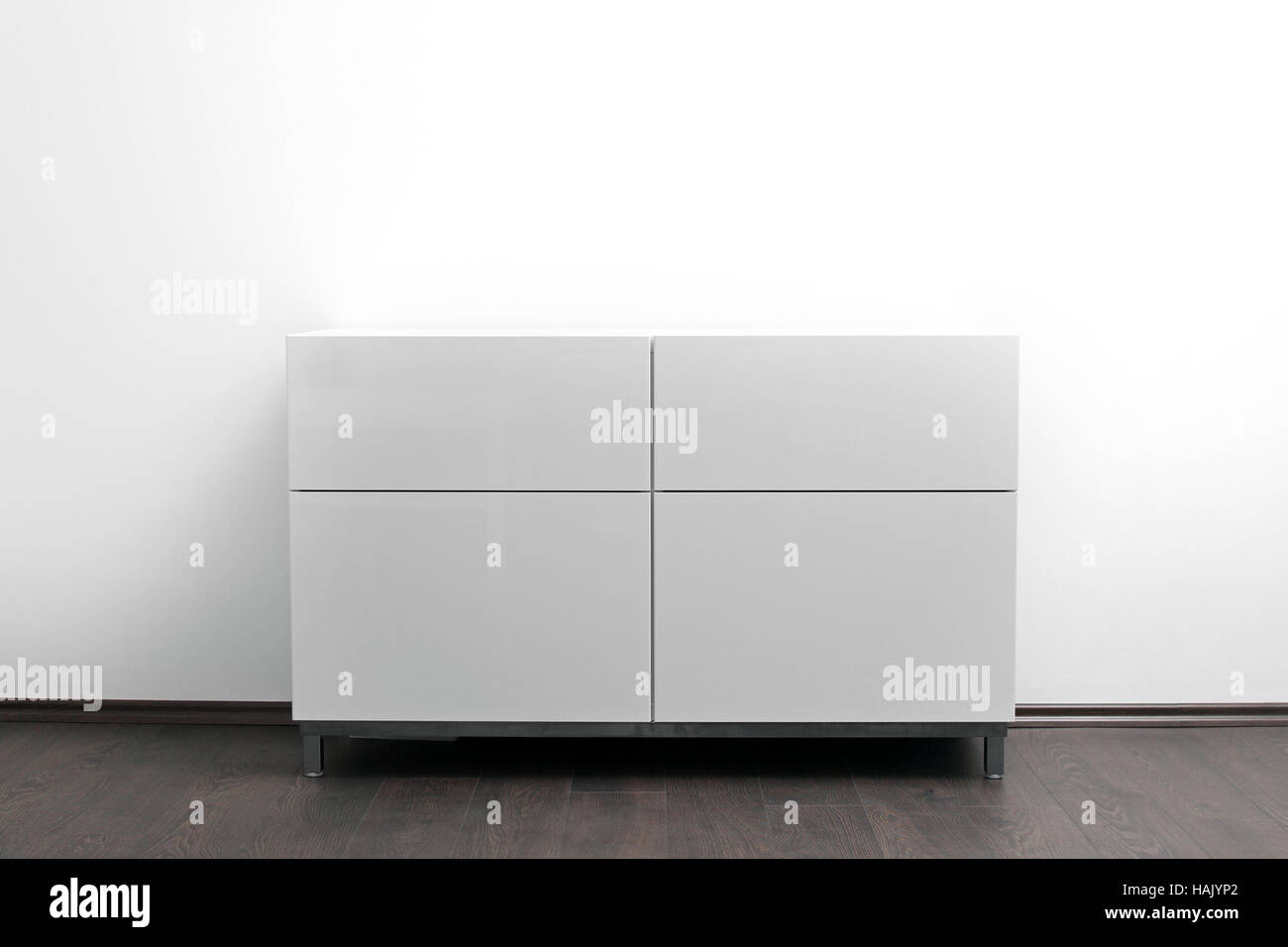 white chest of drawers in bright minimalism interior Stock Photo