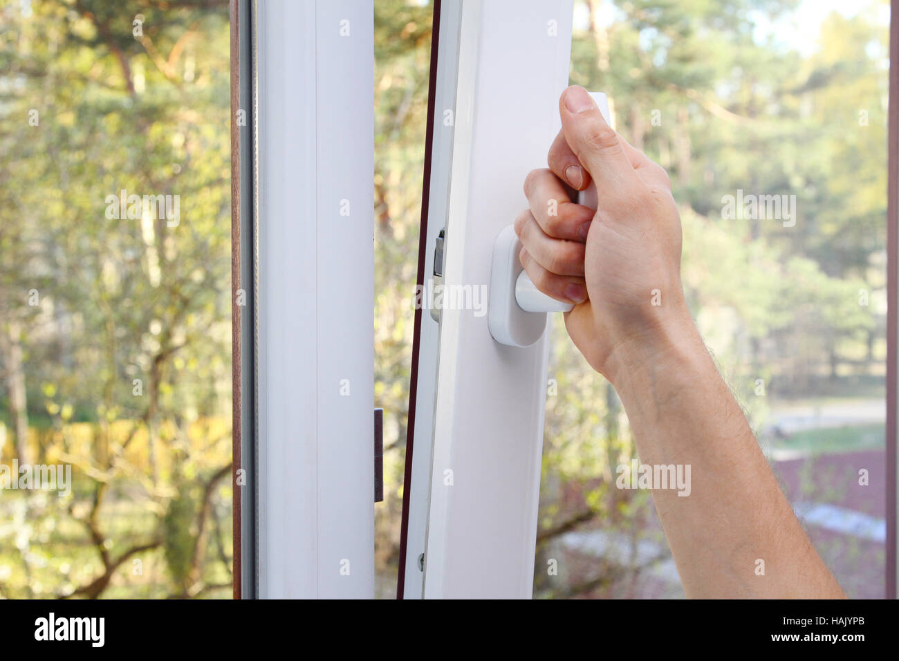 hand open plastic window Stock Photo