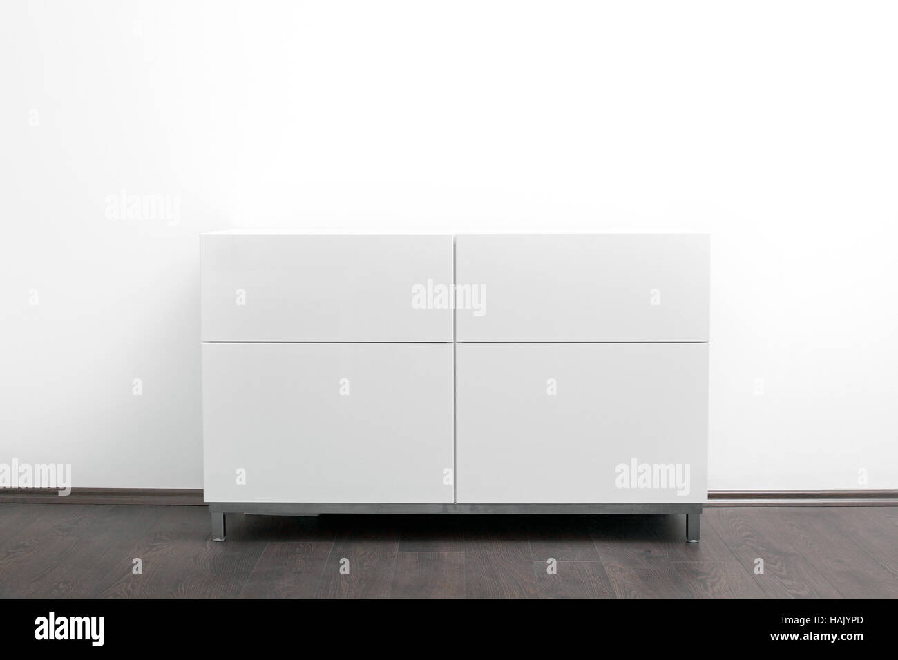 white chest of drawers in bright minimalism interior Stock Photo