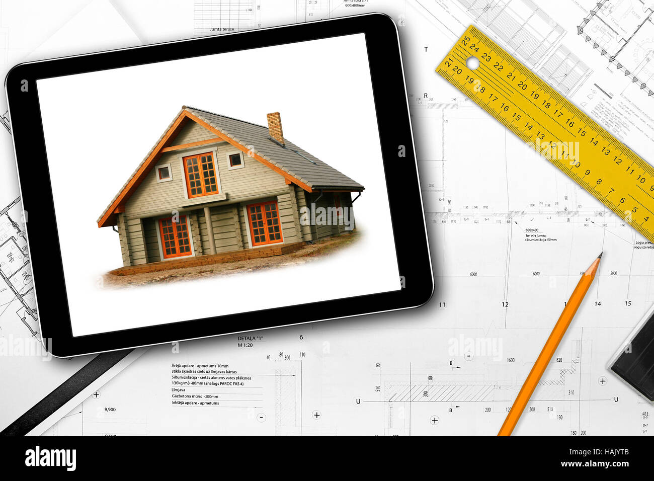 digital tablet, tools and architect draft on the table Stock Photo