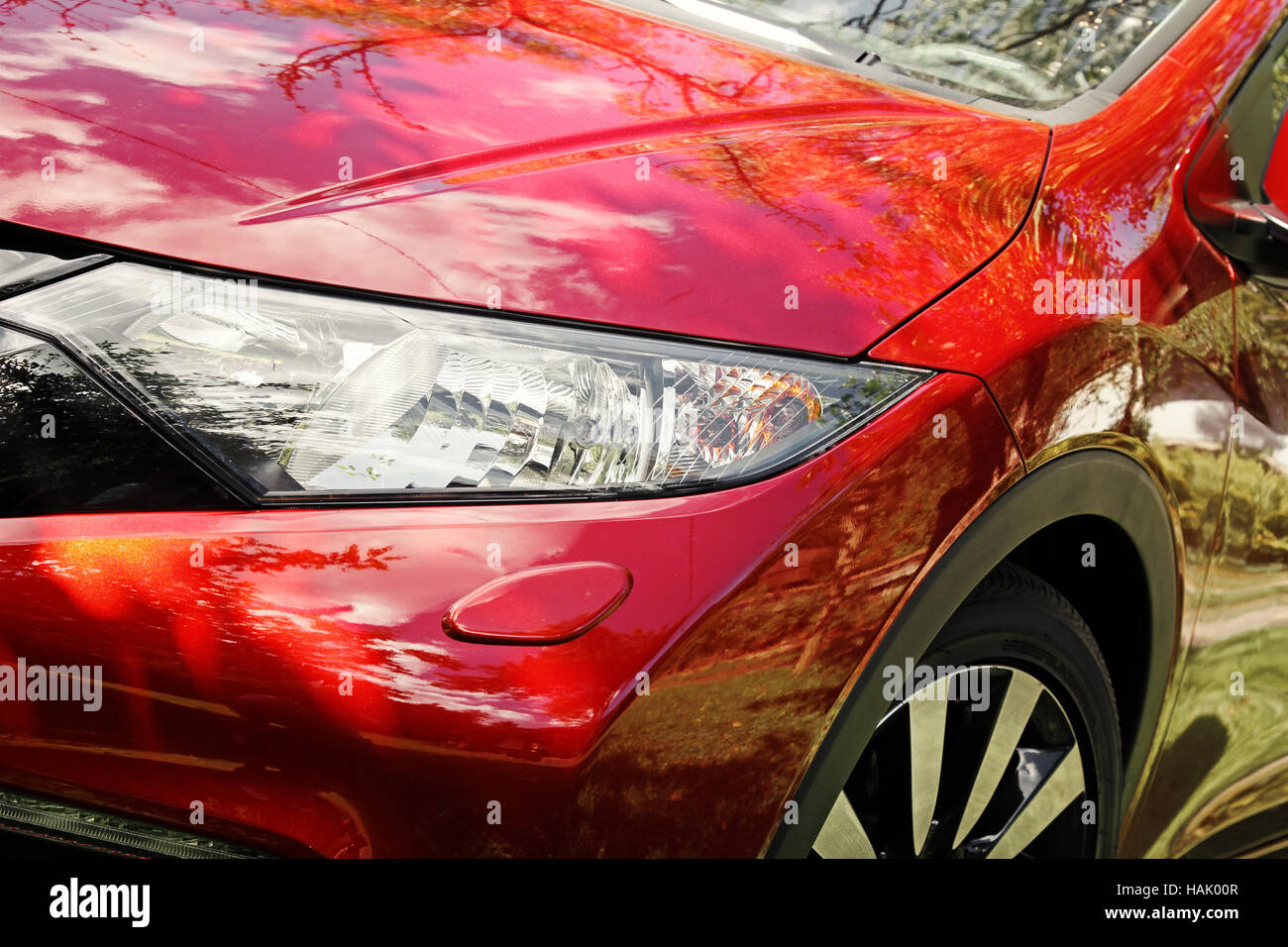 closeup of modern red sport car headlight Stock Photo