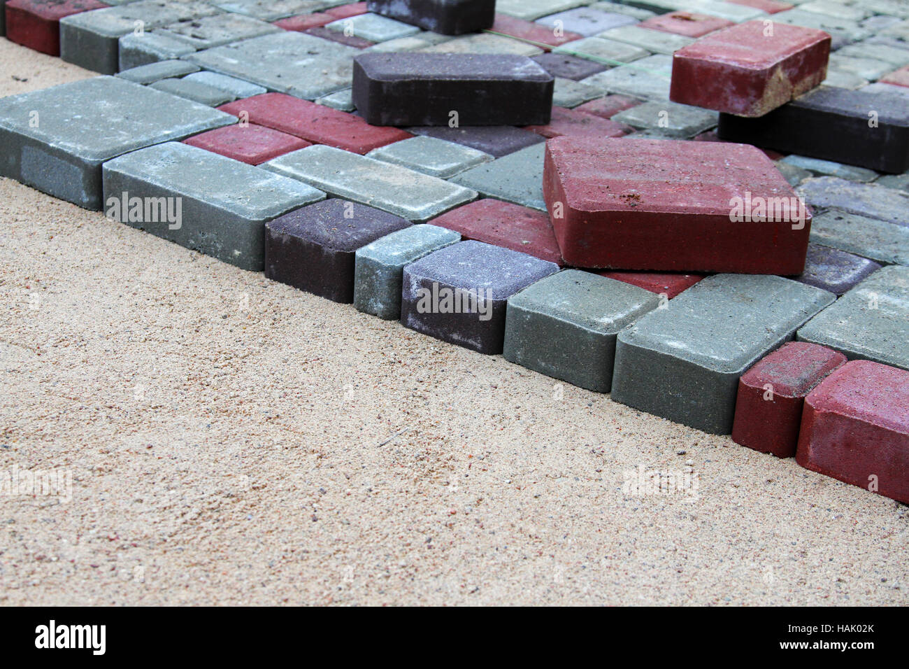 gravel and colorful pavement bricks Stock Photo