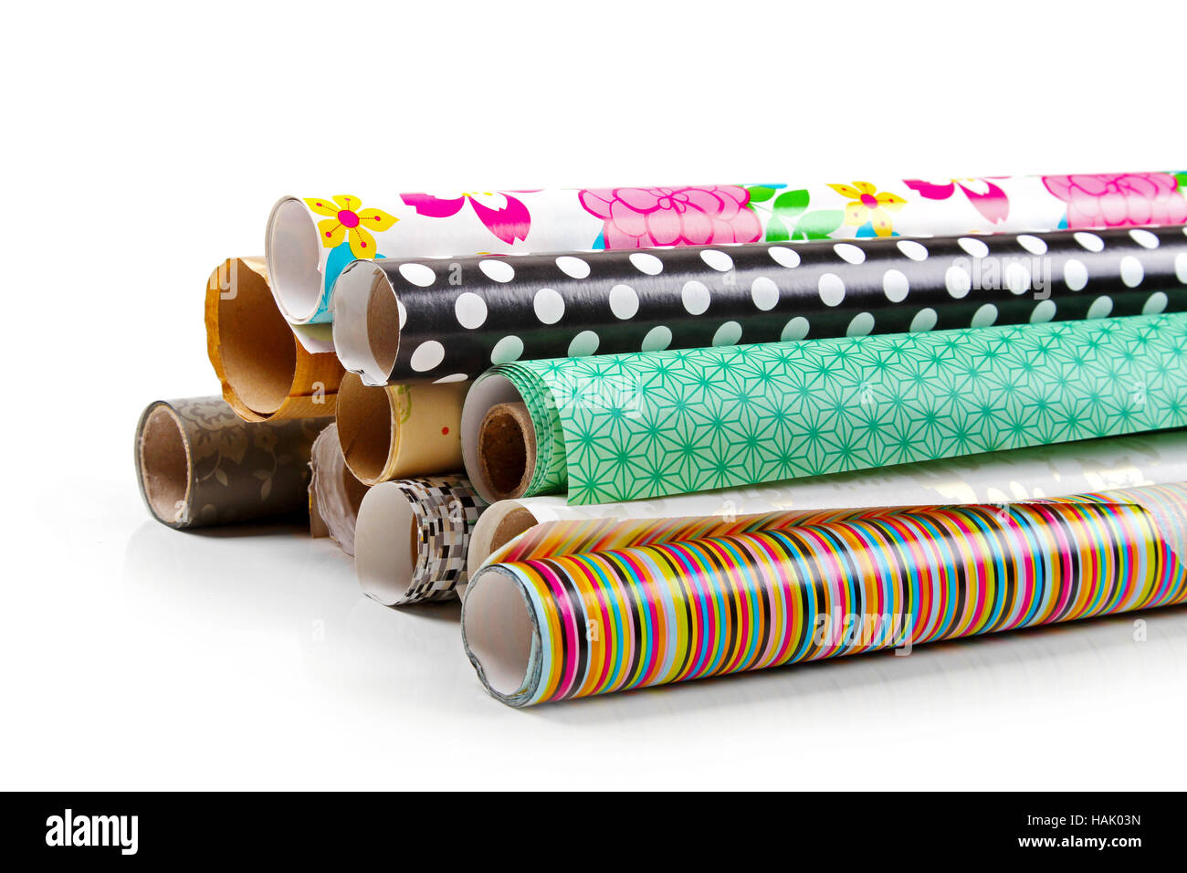 rolls of colorful wrapping paper isolated on white Stock Photo