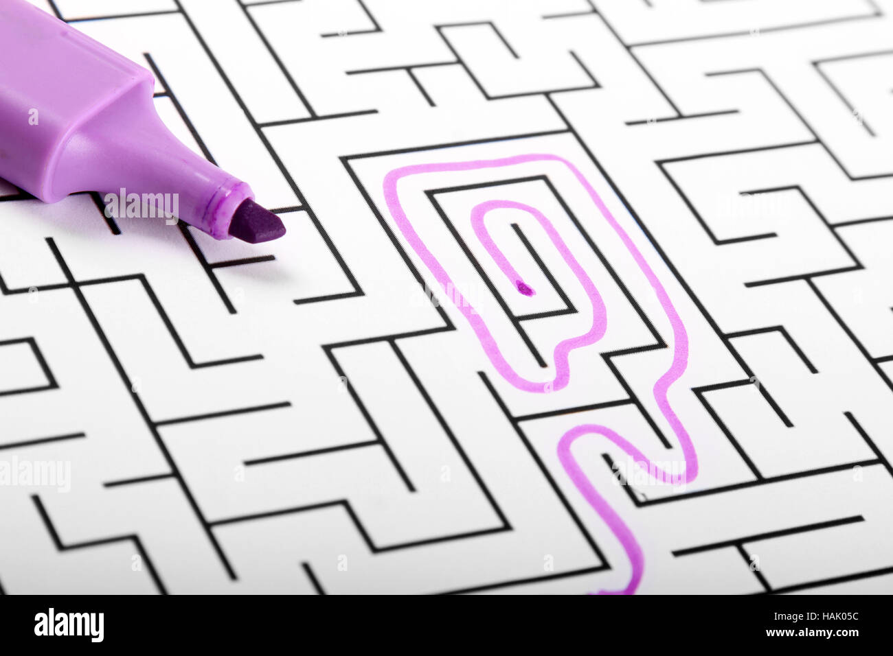 trying to find way out of maze Stock Photo