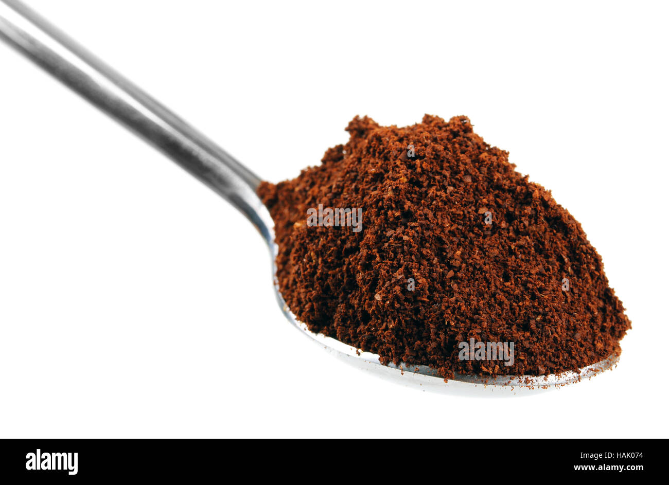 spoon full with coffee isolated on white Stock Photo