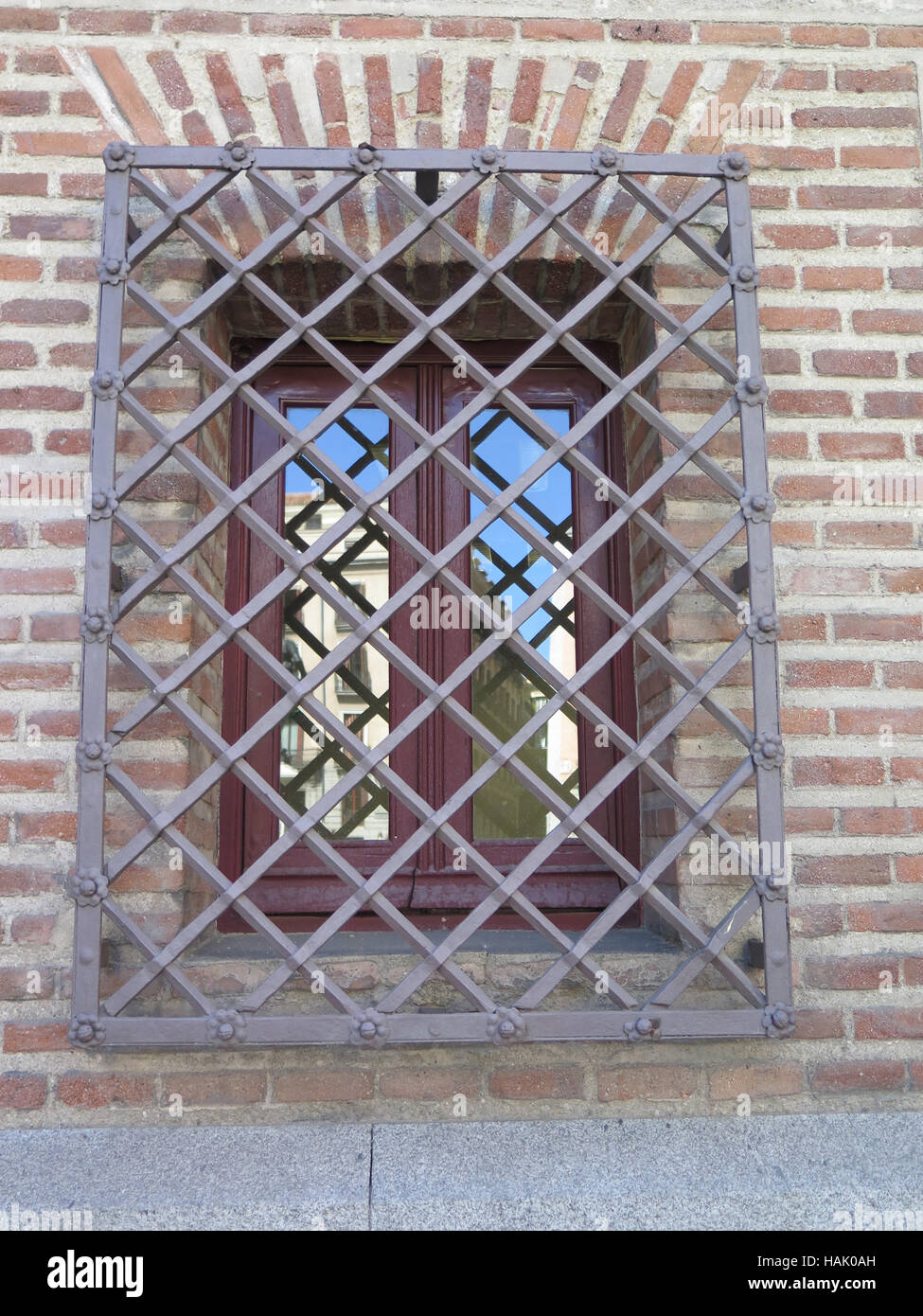 Wrought Iron Grill or bars on Window in central Madrid, Spain Stock Photo