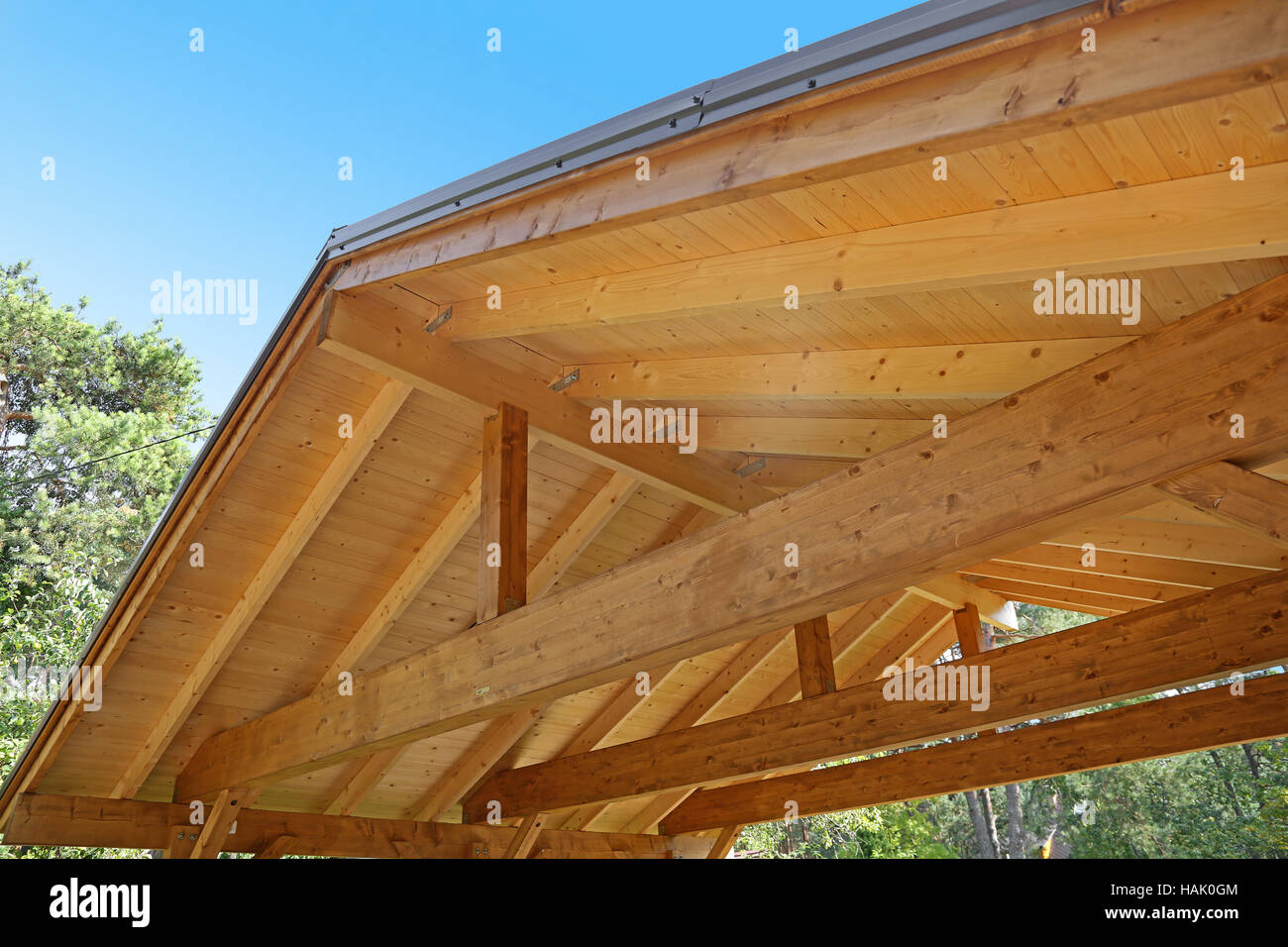wooden roof construction of outdoor carport Stock Photo