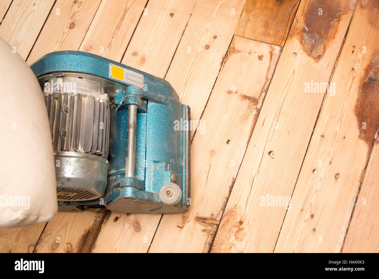 old plank floor and grinding machine with copy space Stock Photo