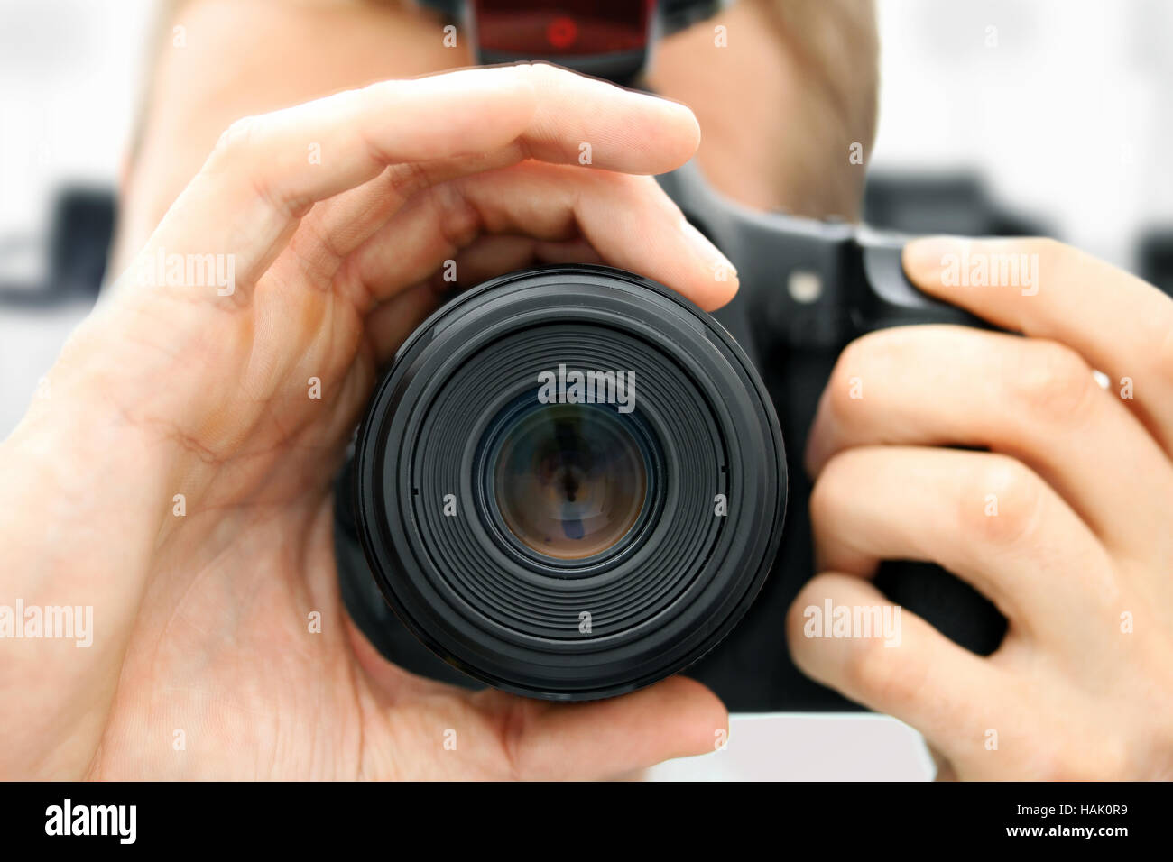 front view of man holding camera. closeup Stock Photo