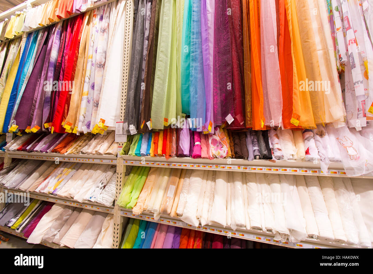 textiles for sale in fabric shop Stock Photo