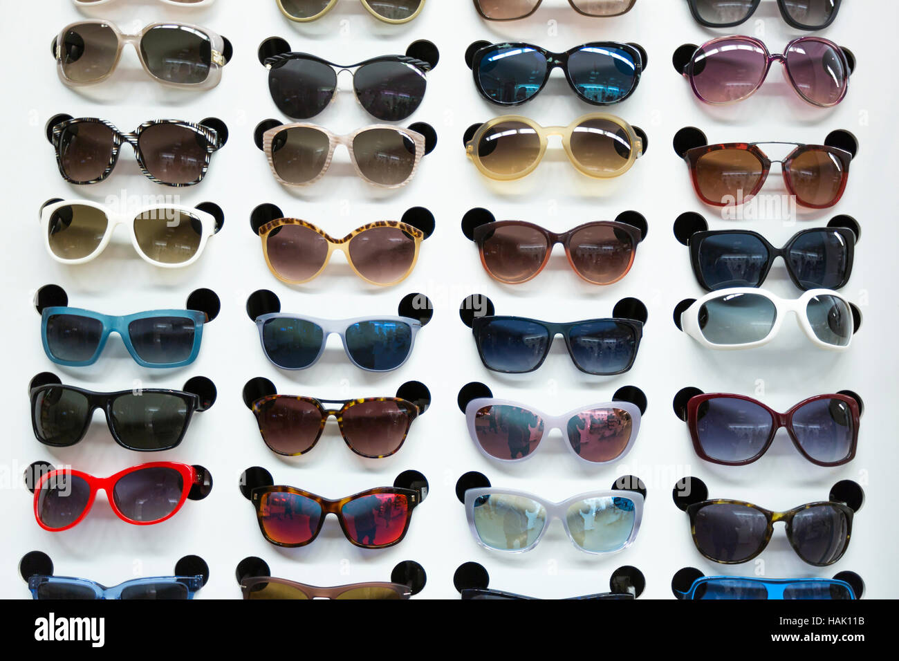 rack with sunglasses in eyewear store Stock Photo