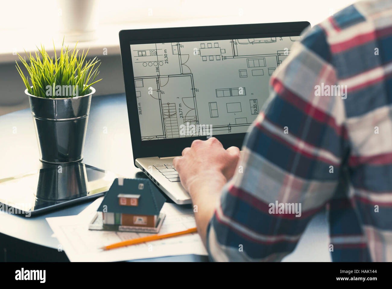 architect, interior designer occupation - man working on new house project at office Stock Photo