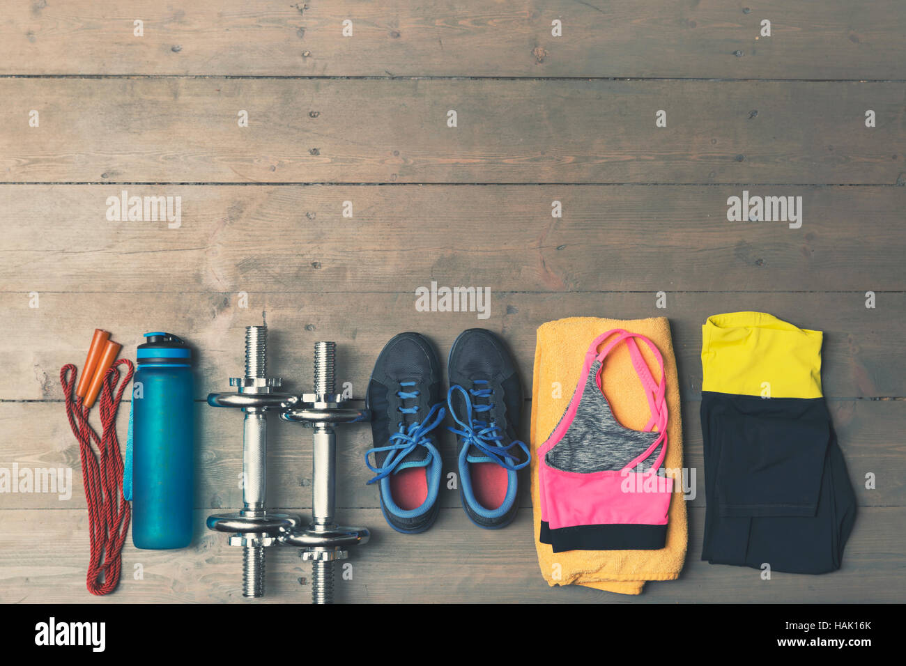 top view of fitness, gym equipment on wooden floor Stock Photo