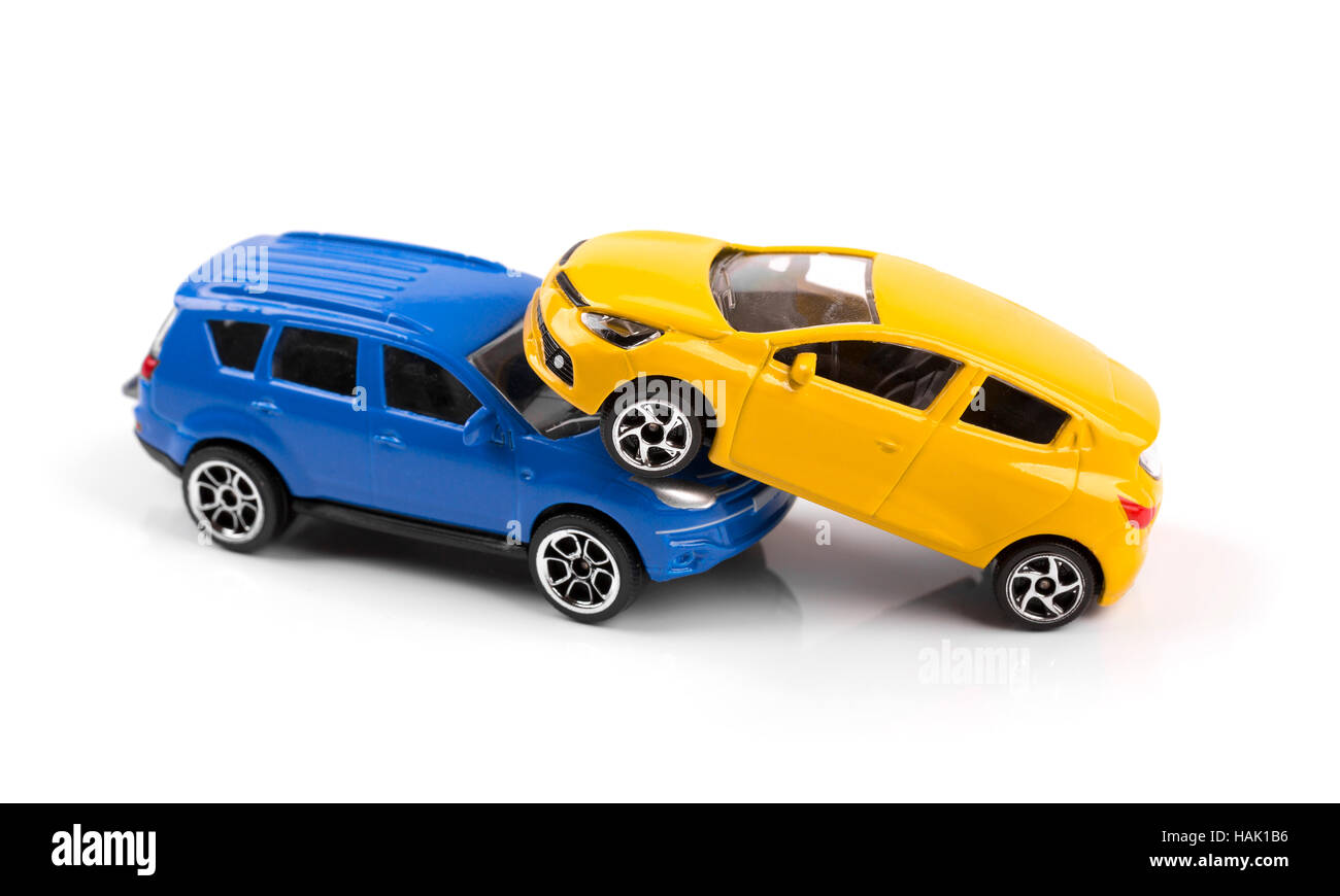 car accident concept, two toy cars isolated on white Stock Photo